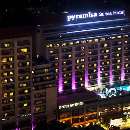 Pyramisa Suites Hotel Cairo Giza Ngoại thất bức ảnh The hotel at night